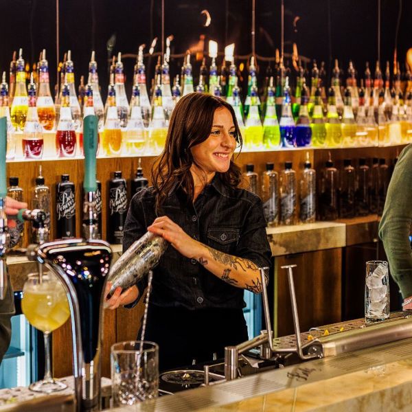 Bartender pours an espresso martini from the Springbay 3-tap during the Bols collaboration