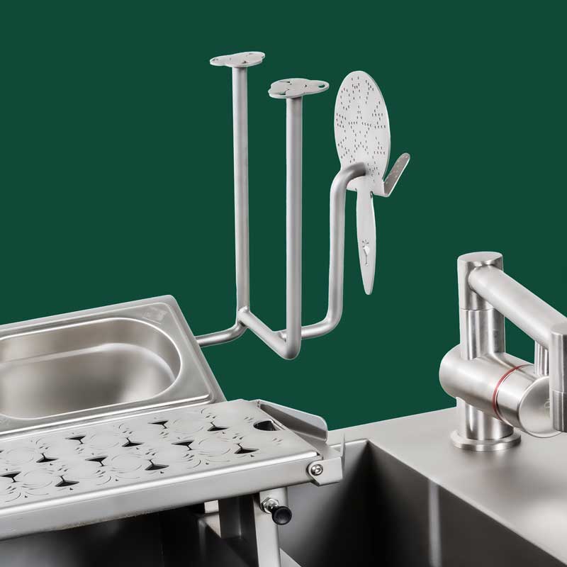The station's separate parts: tap handles, swivel tap and garnish tray
